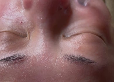 Close-up of a serene face during a facial at Haengbokskingan (Happy Skin Time), Singapore, Singapore, SG.