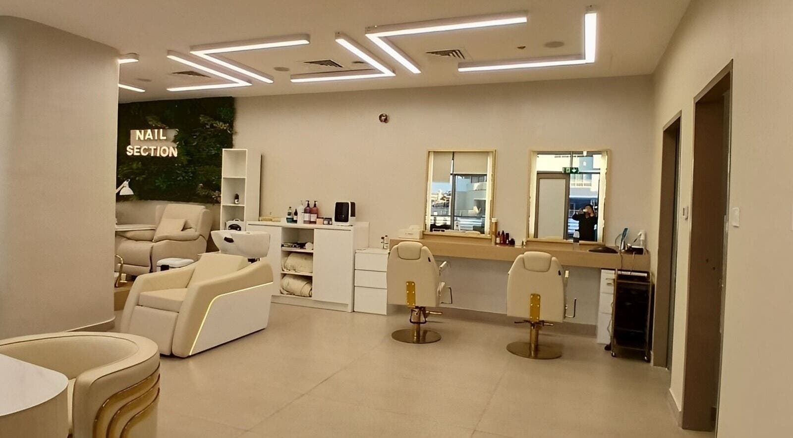 Chic interior of Hair Space Ladies Salon by Zain & Steve in Abu Dhabi, AE, featuring nail and hair sections.