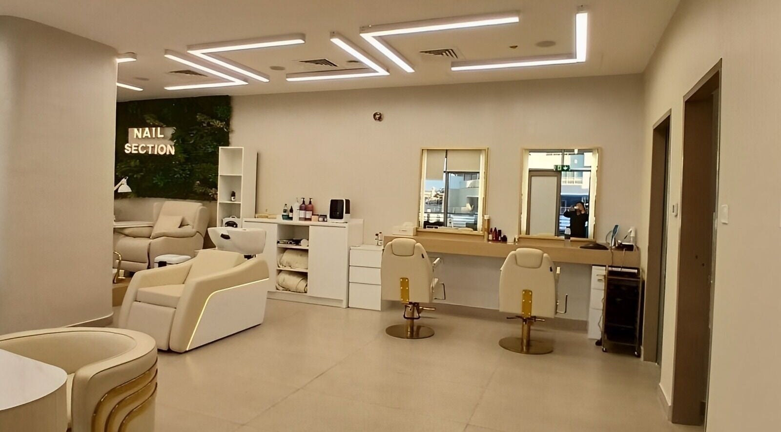 Chic interior of Hair Space Ladies Salon by Zain & Steve in Abu Dhabi, AE, featuring nail and hair sections.