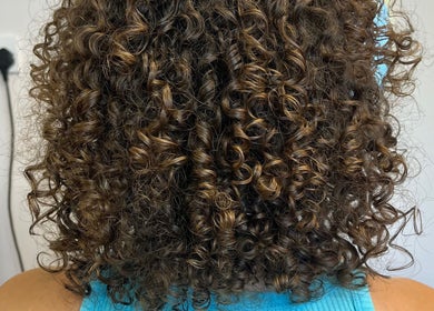 Beautiful curly hair styled at KW Hairdressing, Braywoodside, England, GB. Perfectly defined ringlets.