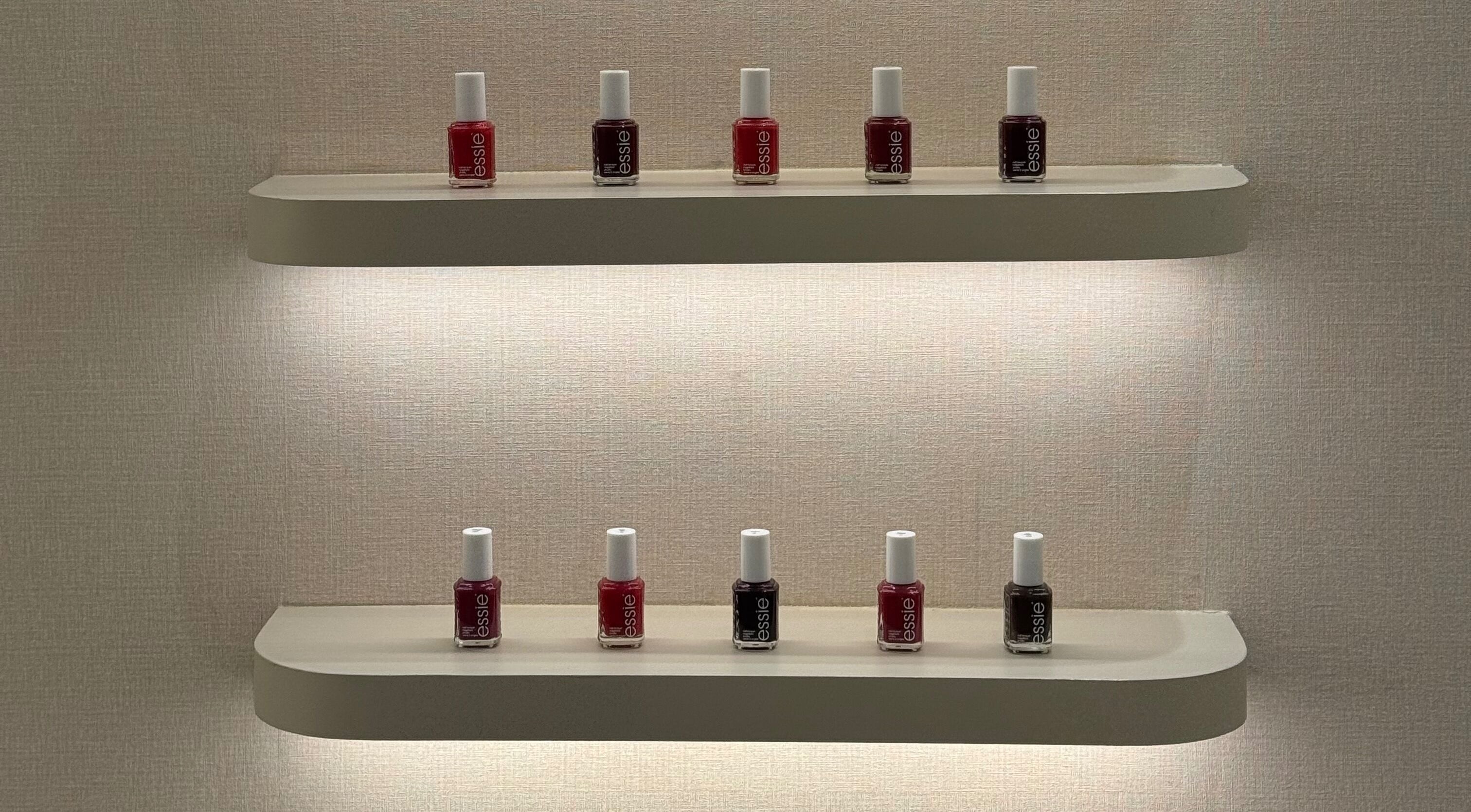 Elegant nail polish display at Beauty Bloom Salon, دبي, دبي, AE, showcasing vibrant color selection.