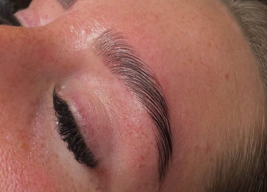Expert brow shaping at Glos Brows & Body, Exeter, England, GB enhances natural beauty with precision.