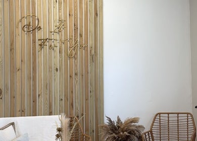 Rustic wood decor with chairs at Blushed By Talia, Workington, England, GB.