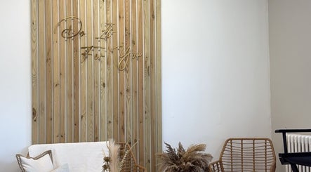 Rustic wood decor with chairs at Blushed By Talia, Workington, England, GB.