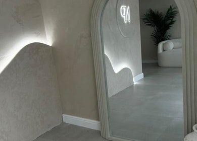 Modern mirror and soft lighting detail at Blushed By Talia, Cockermouth, England, GB.