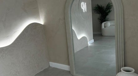 Modern mirror and soft lighting detail at Blushed By Talia, Cockermouth, England, GB.