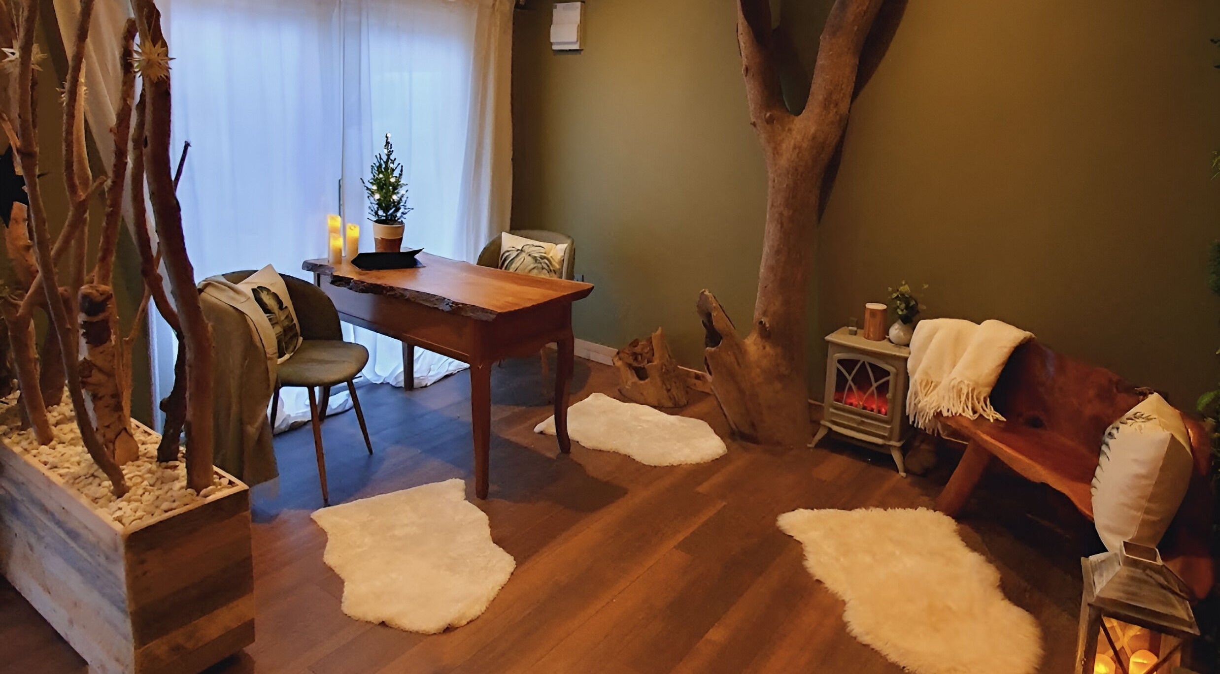 A cozy, rustic room at The Nurture Sanctuary in Broadwindsor, England, GB, featuring warm wood tones.
