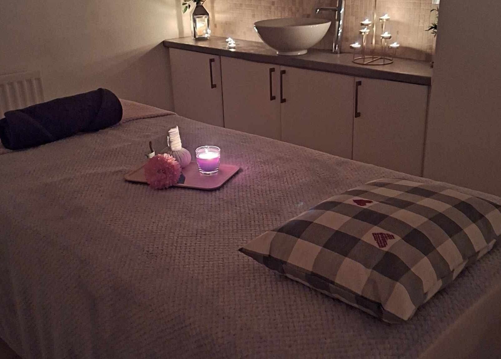 Calm spa room at Finn Spa in Manchester, Chadderton, England, GB, featuring a relaxing massage table.