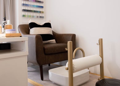 Pedicure chair and nail polish display at Furious Filer, Gosh Gosh PMU Clinic, London, England, GB.