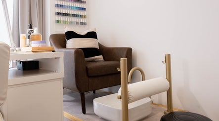 Pedicure chair and nail polish display at Furious Filer, Gosh Gosh PMU Clinic, London, England, GB.