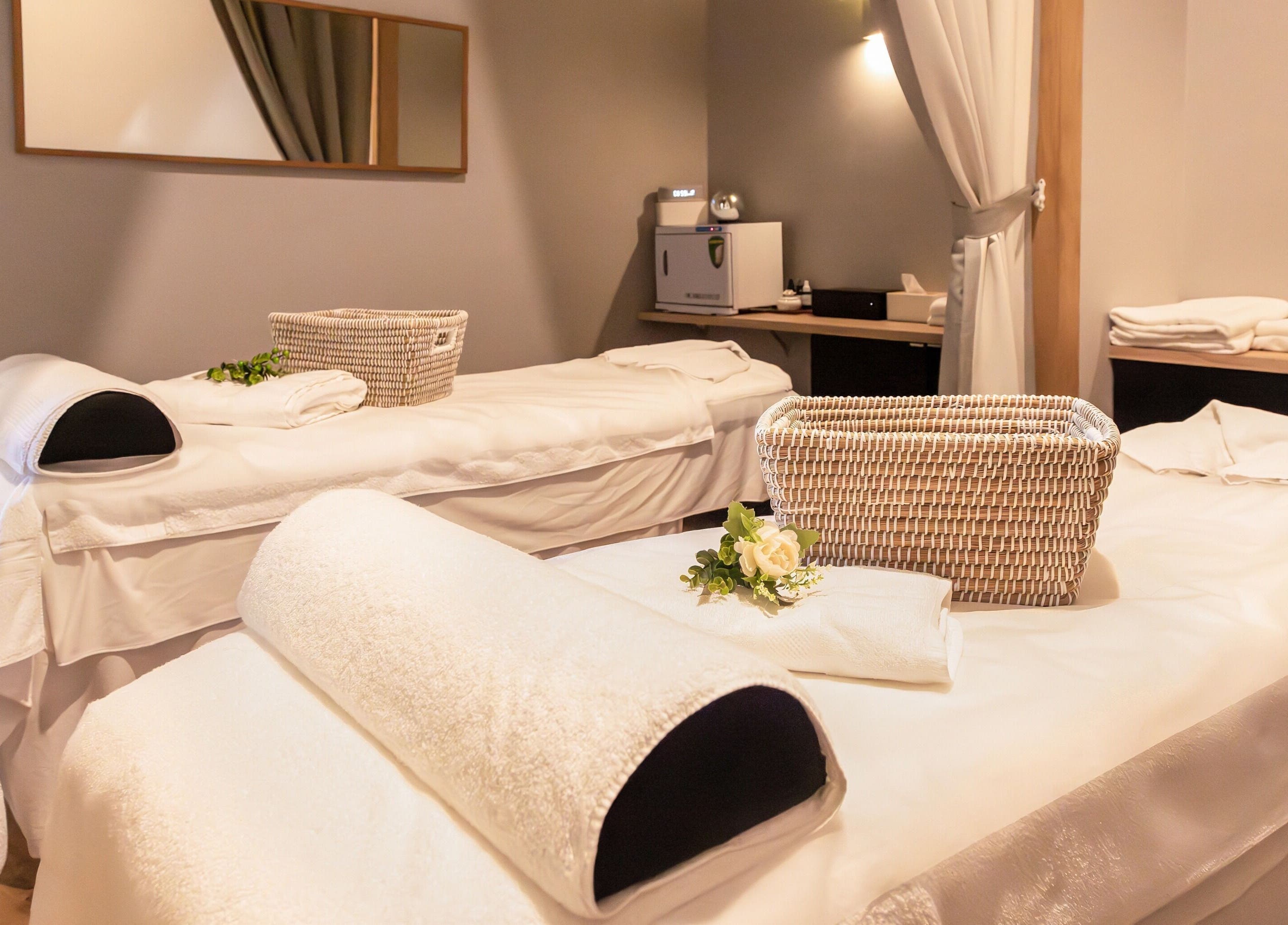Relaxing massage room at Retreat Massage and Wellness, Southport, Queensland, AU with cozy treatment beds.