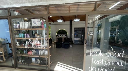 Entrance view of Le Chic Hair & Beauty in Polokwane, Limpopo, ZA, showcasing stylish salon ambiance.