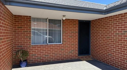 Charming entrance of Glow Lash and Brow Studio, Greenfields, Western Australia, AU with brick facade.