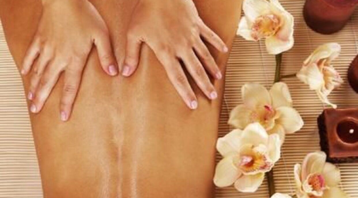 Massage at De Lune Beauty Spa, Johor Bahru, Johor Darul Ta'zim, MY with orchids and candles.