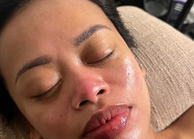 Client experiencing a facial treatment at Rejuvenating Touch, Cardiff, Wales, GB.