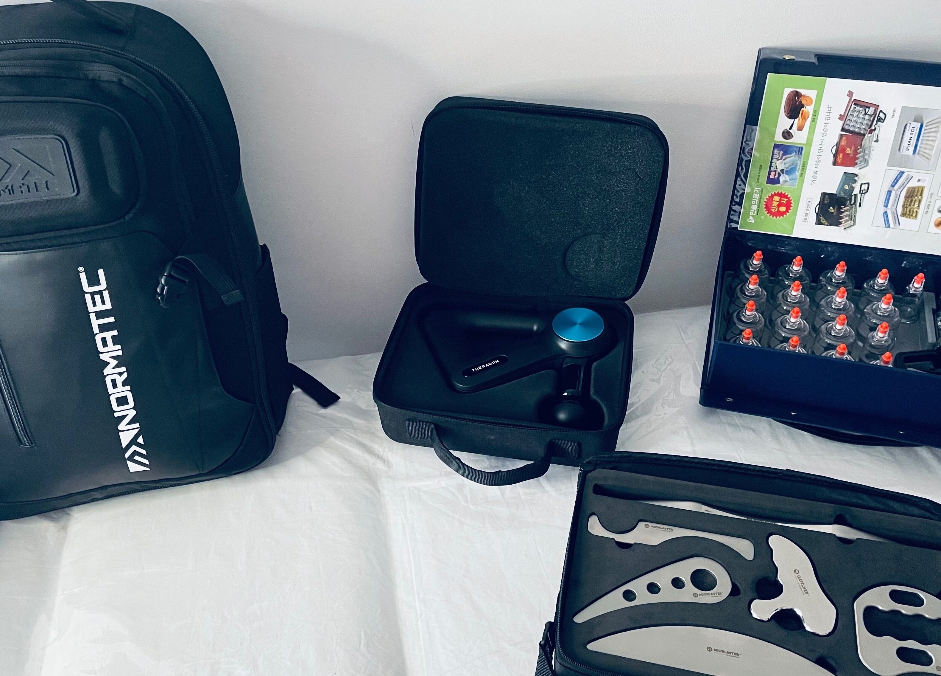 Therapy tools at TC Sports Therapy and Massage, Heelands, England, GB. Includes massage gun, cupping kit, and more.