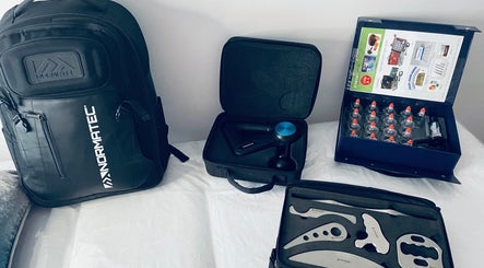 Therapy tools at TC Sports Therapy and Massage, Heelands, England, GB. Includes massage gun, cupping kit, and more.