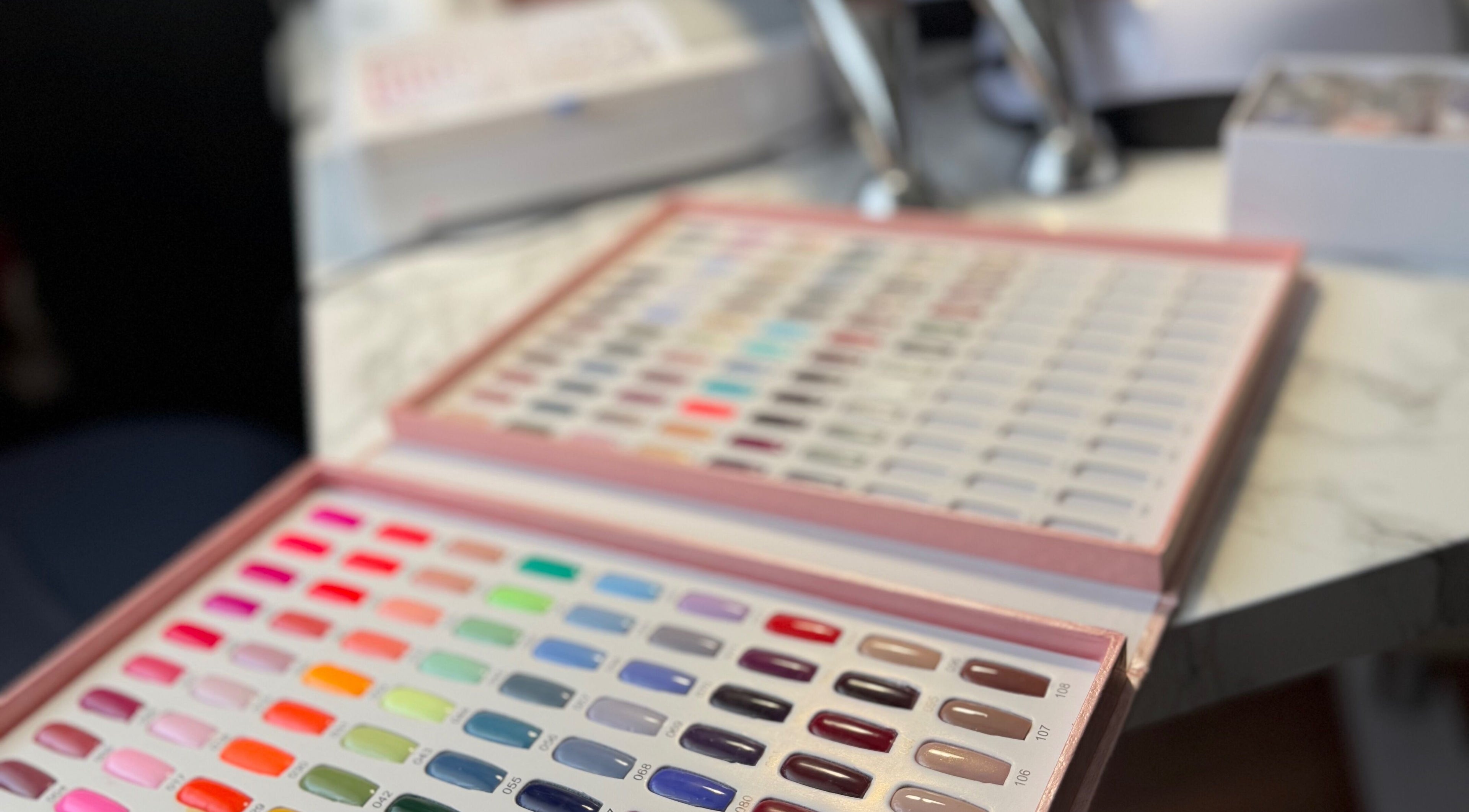 Nail color samples at TC Sports Therapy and Massage in Heelands, England, GB, showcasing vibrant options.