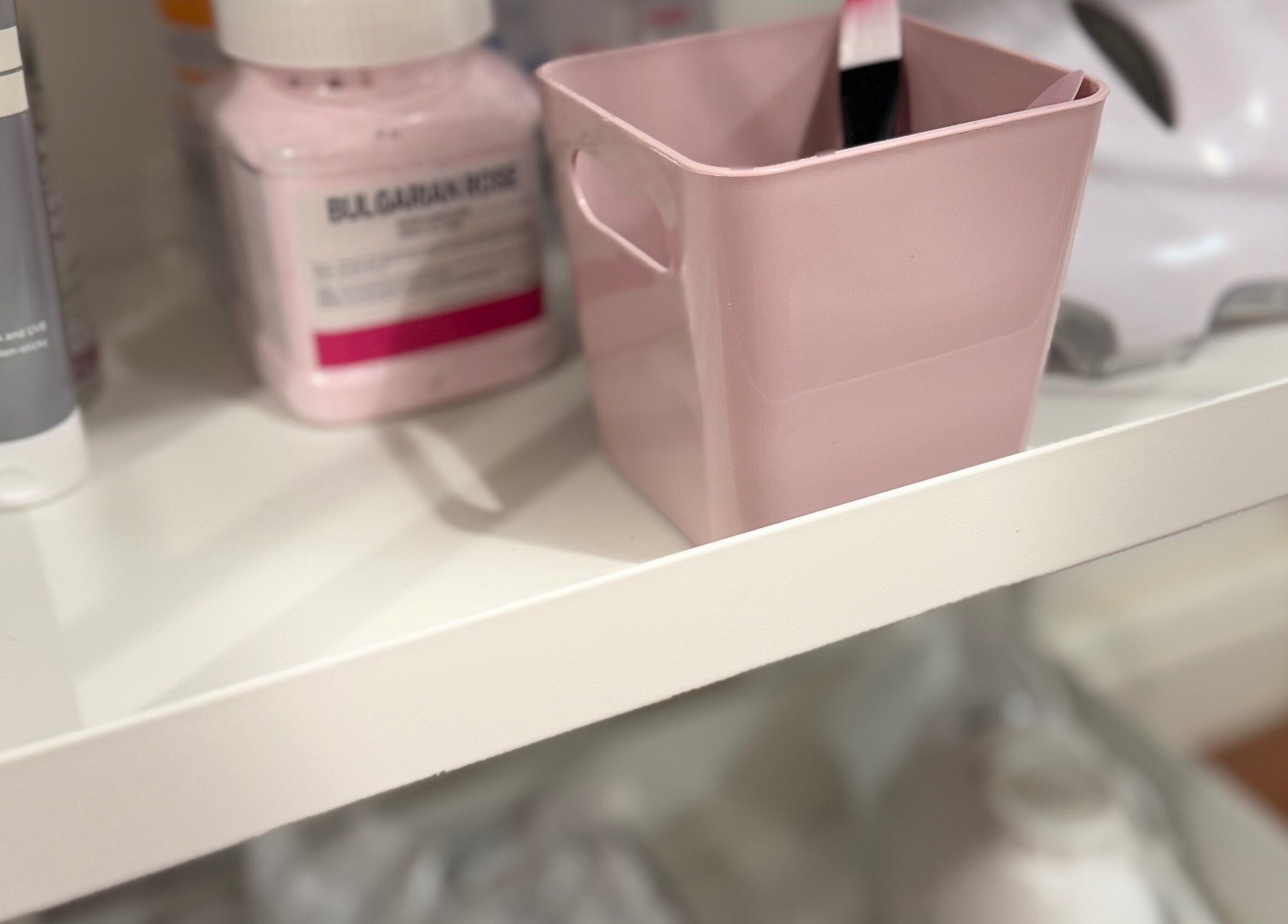 Shelf with beauty products at TC Sports Therapy and Massage, Heelands, England, GB.