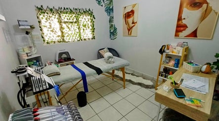 Tranquil treatment room at Izelke's Sculpt And Glow Studio in Cape Town, Western Cape, ZA, featuring a massage table.