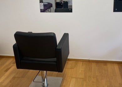 Modern salon chair in Reece Goldsmith Hairdressing, Swineshead, England, GB.
