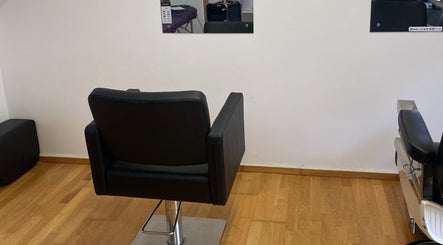Modern salon chair in Reece Goldsmith Hairdressing, Swineshead, England, GB.