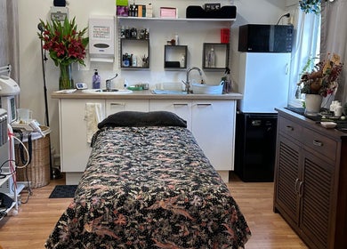 Cozy treatment room at The New You Beauty and Wellness, Maclean, New South Wales, AU with massage table.