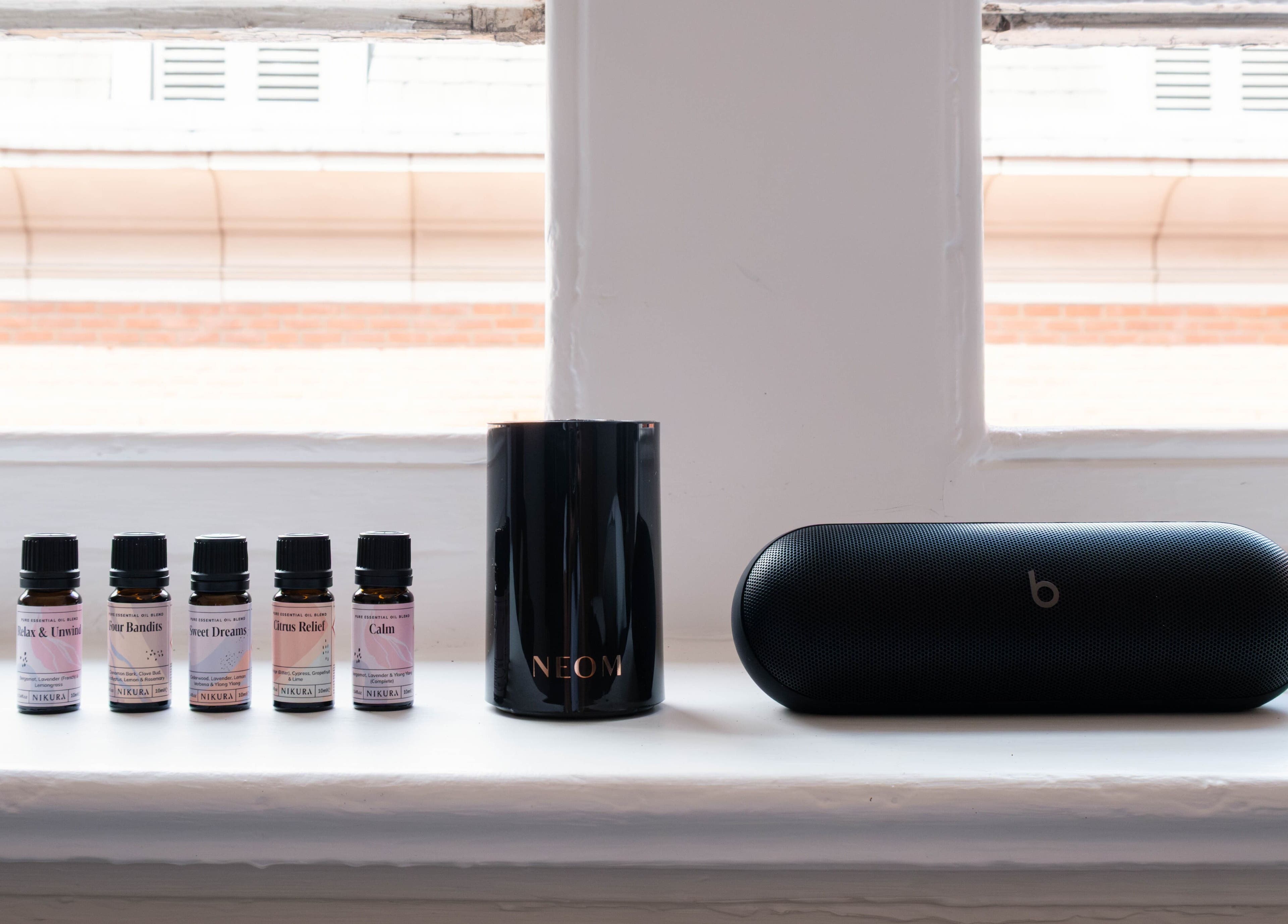 Essential oils and candle at Soho Beauty & Aesthetics, London, England, GB offer relaxation and comfort.