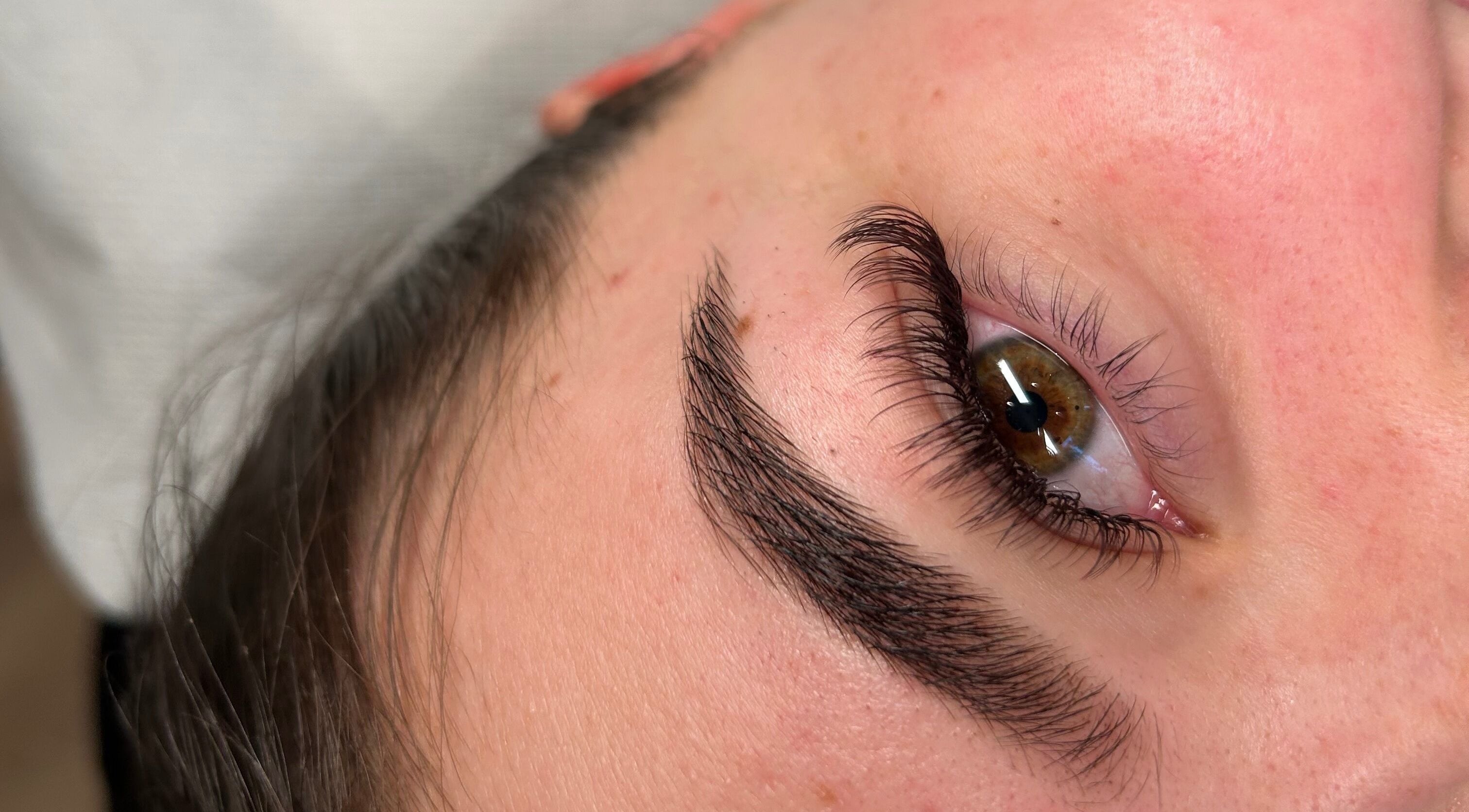 Beautifully styled eyebrows at DIVINEGLOWBYSOPHIE, Sandridge, England, GB, showcasing expert grooming.