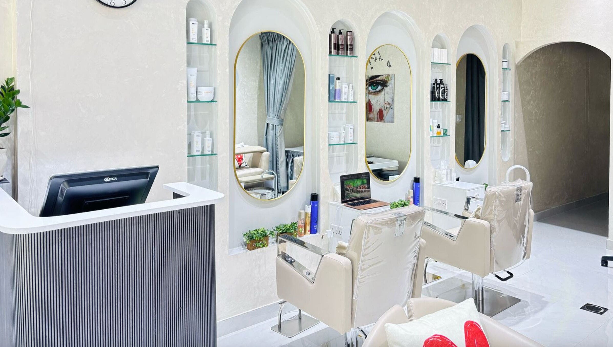 Stylish interior of Moonlash Ladies Salon in Dubai, Dubai, AE, featuring sleek chairs and modern decor.