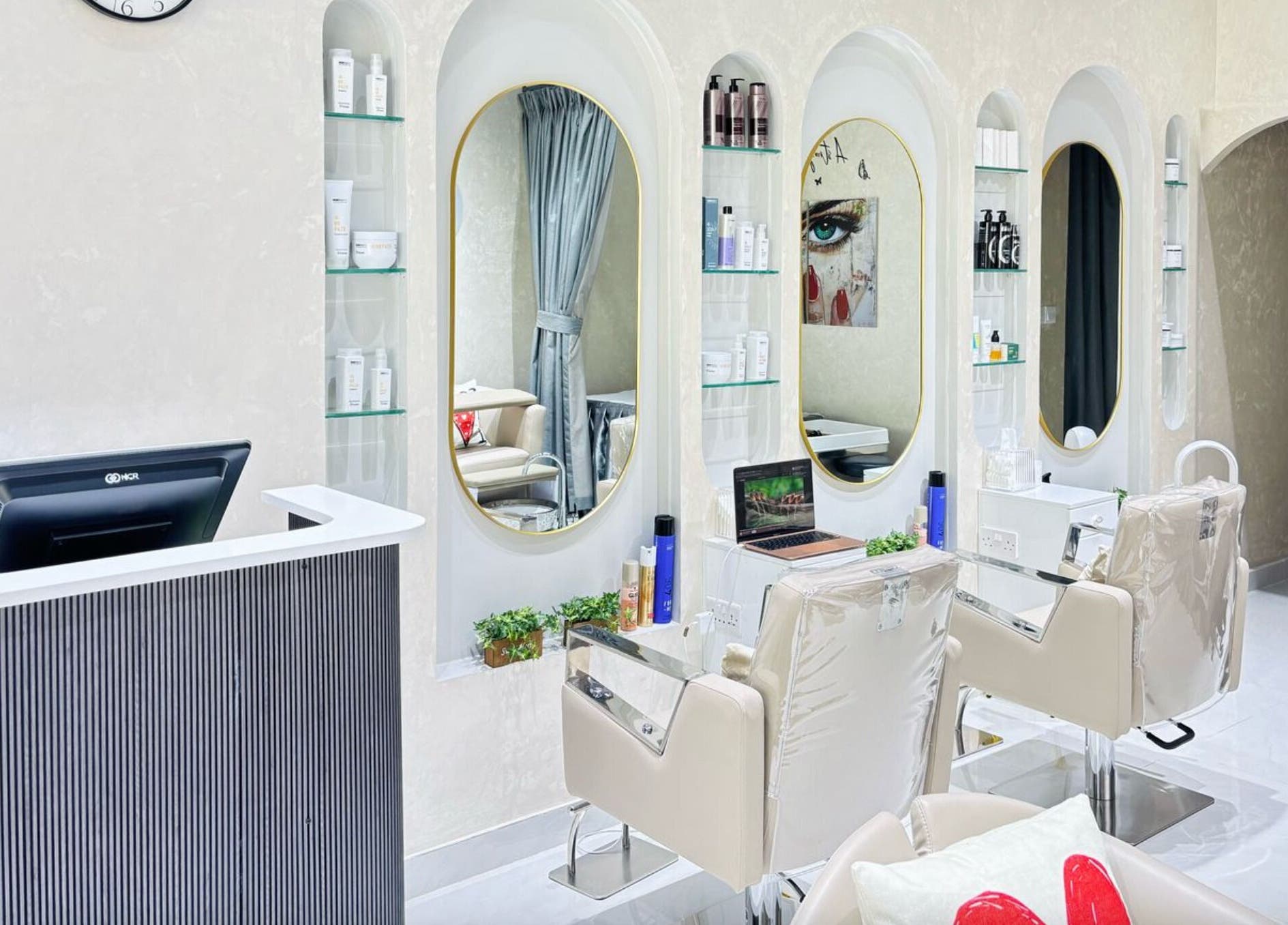 Stylish interior of Moonlash Ladies Salon in Dubai, Dubai, AE, featuring sleek chairs and modern decor.
