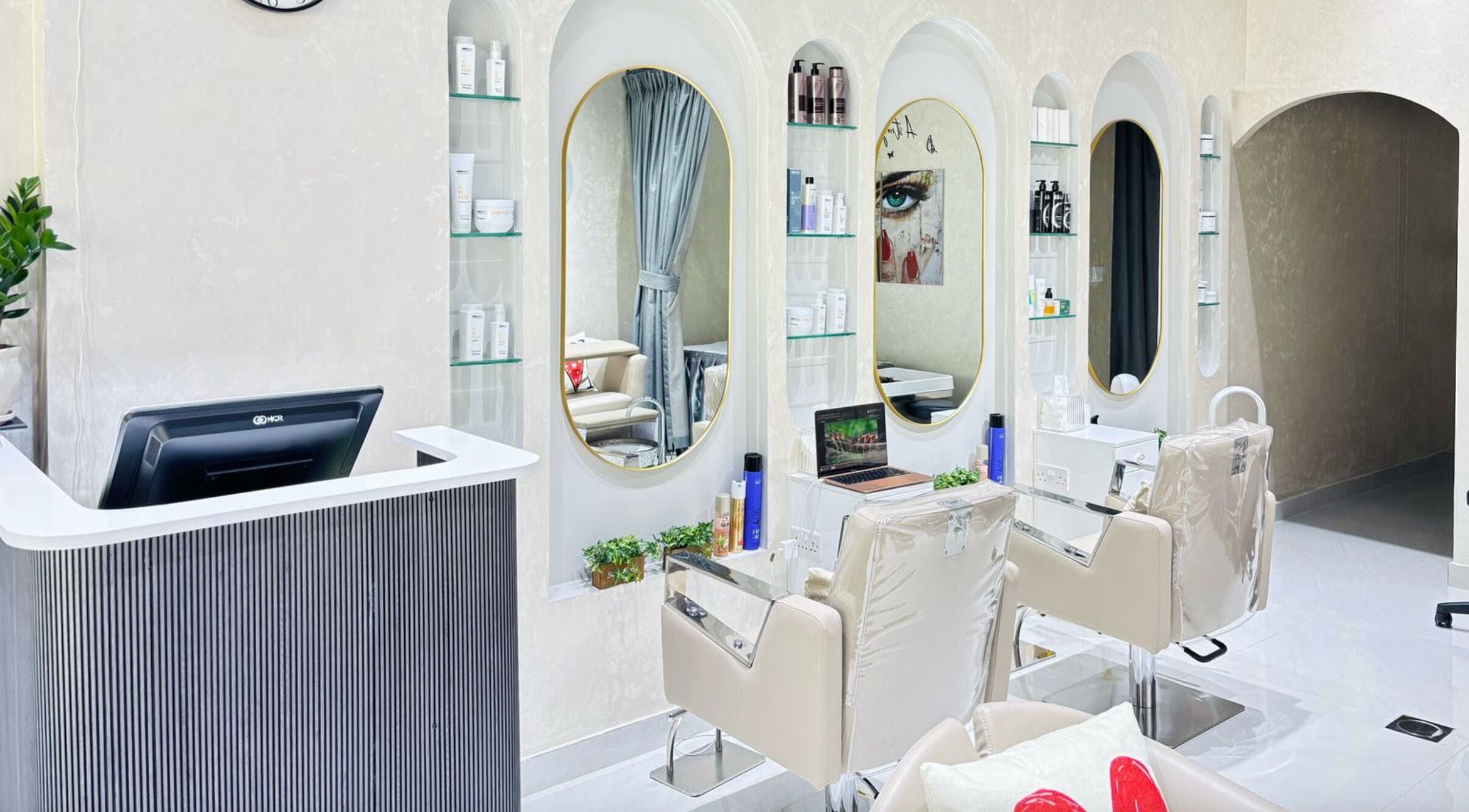 Stylish interior of Moonlash Ladies Salon in Dubai, Dubai, AE, featuring sleek chairs and modern decor.