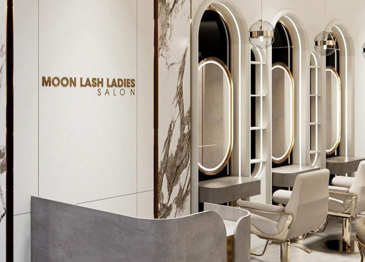 Elegant interior of Moonlash Ladies Salon in Dubai, Dubai, AE showcasing chic salon stations and mirrors.