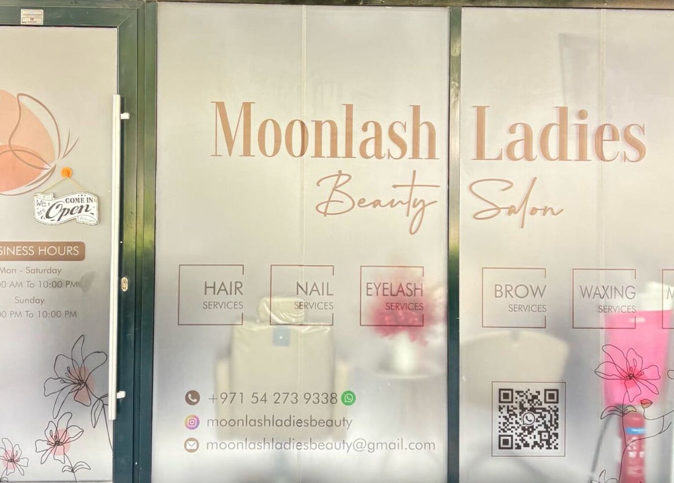 Entrance to Moonlash Ladies Salon in Dubai, Dubai, AE showcasing beauty services and contact details.
