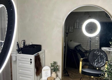 Elegant styling station at Rural Roots Studio, Chapel-en-le-frith, England, GB with modern decor.