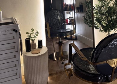 Elegant salon chair and styling area at Rural Roots Studio, Chapel-en-le-Frith, England, GB.
