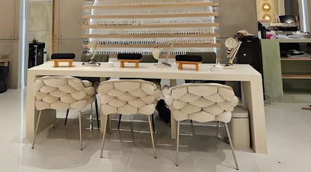Elegant nail station at The Rustic Sun - Nelayan in Bali, Bali, ID, featuring plush chairs and modern design.