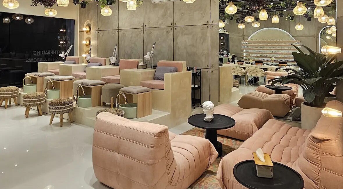 Luxurious seating area at The Rustic Sun - Nelayan, Bali, Bali, ID with modern decor and ambient lighting.