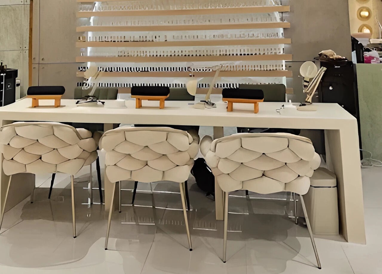 Stylish nail stations at The Rustic Sun - Nelayan, Bali, Bali, ID, featuring plush chairs and modern design.