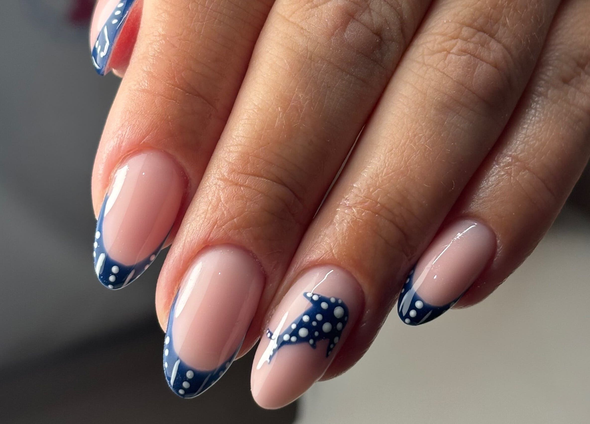 Elegant nail art with blue nautical design by Studio 1 Beauty By Zoe in Exeter, England, GB.