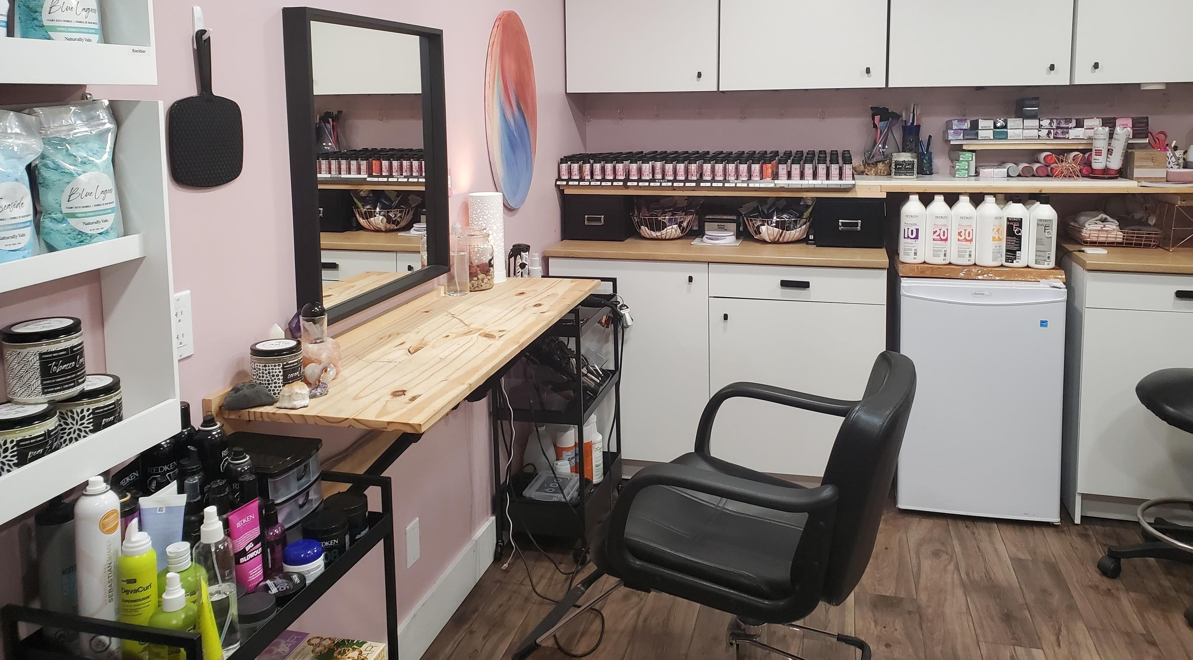 Serene beauty station at Townhouse Beauty, Ottawa, Ontario, CA, showcasing premium products and cozy ambiance.