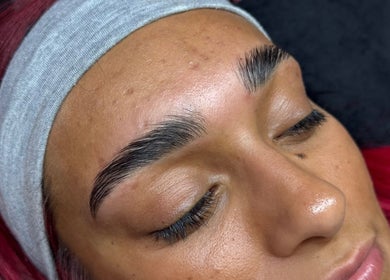 Close-up of sleek eyebrows groomed at Beauty Calls Mcr Skulpt Studios, Manchester, England, GB.
