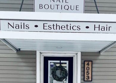 Lucid Lashes front with sign showcasing nails, esthetics, and hair services in Antigonish, Nova Scotia, CA.