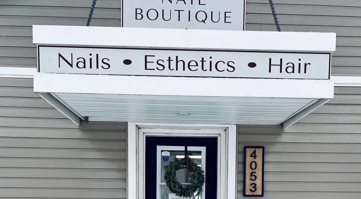 Lucid Lashes entrance with signage for nails, esthetics, hair in Antigonish, Nova Scotia, CA.