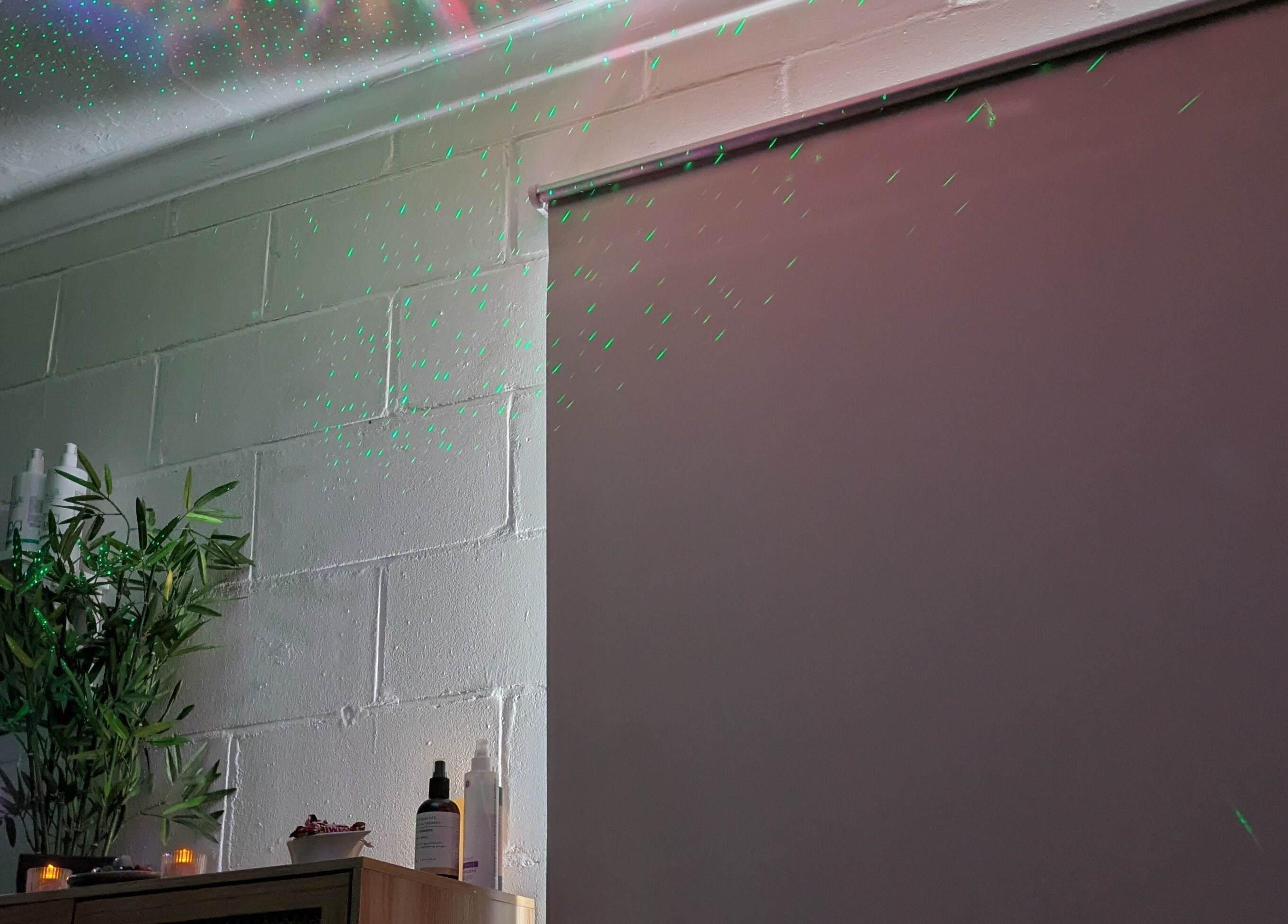 Tranquil corner at New Leaf Massage, Brandon, England with ambient lighting and greenery.