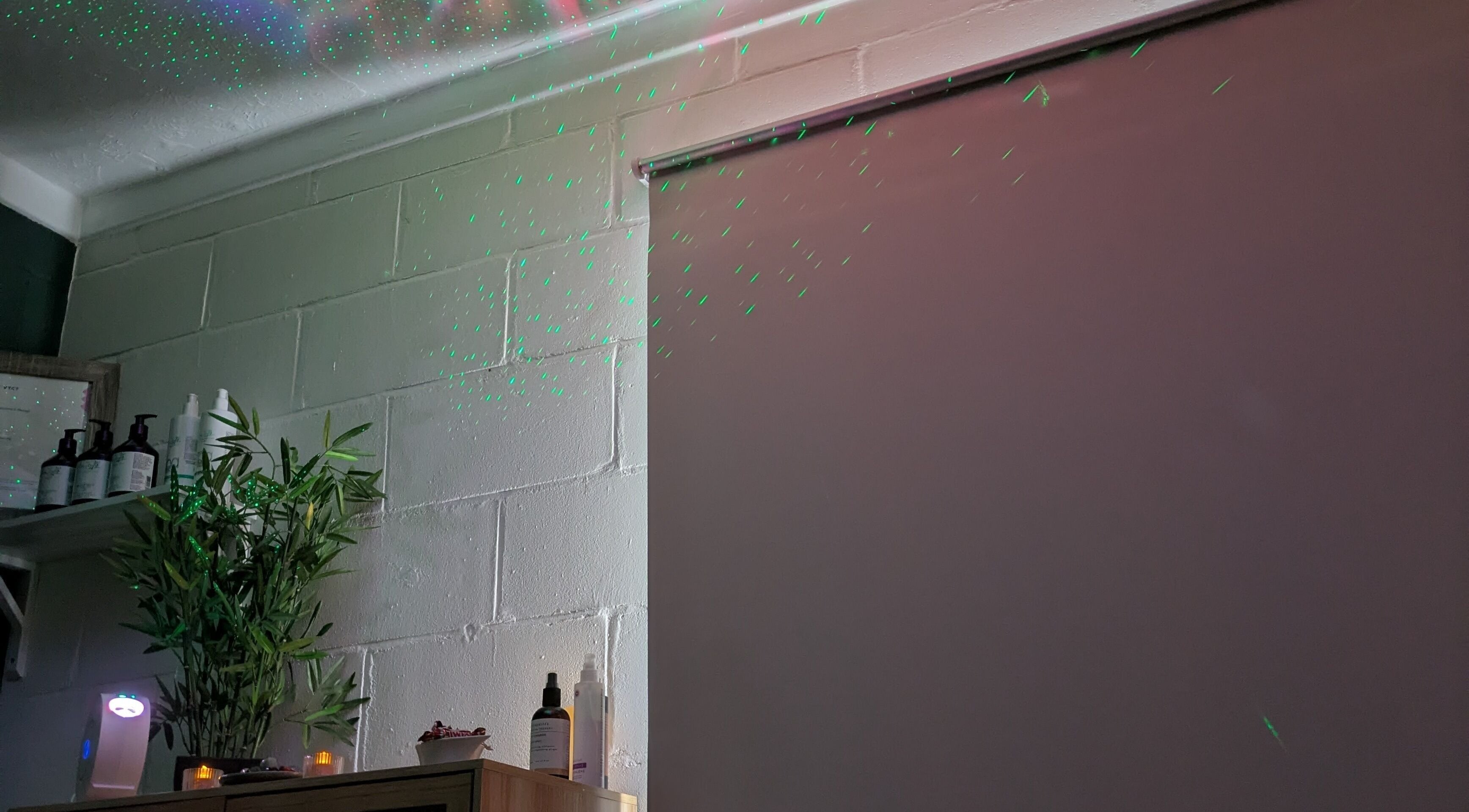 Tranquil corner at New Leaf Massage, Brandon, England with ambient lighting and greenery.