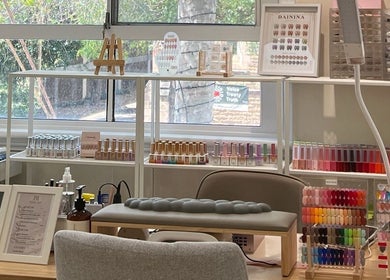 Bloom Nail Beauty in Burwood, New South Wales, AU showcasing nail polish selection and elegant workspace.
