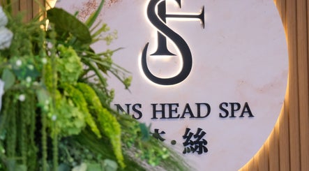 Logo of Fans Head Spa Oakville with lush greenery, located in Oakville, Ontario, CA.