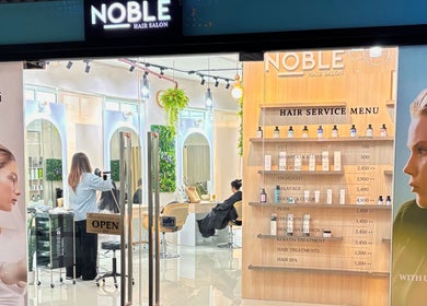 Noble Hair Salon Bangkok entrance with service menu, located in Krung Thep Maha Nakhon, TH.