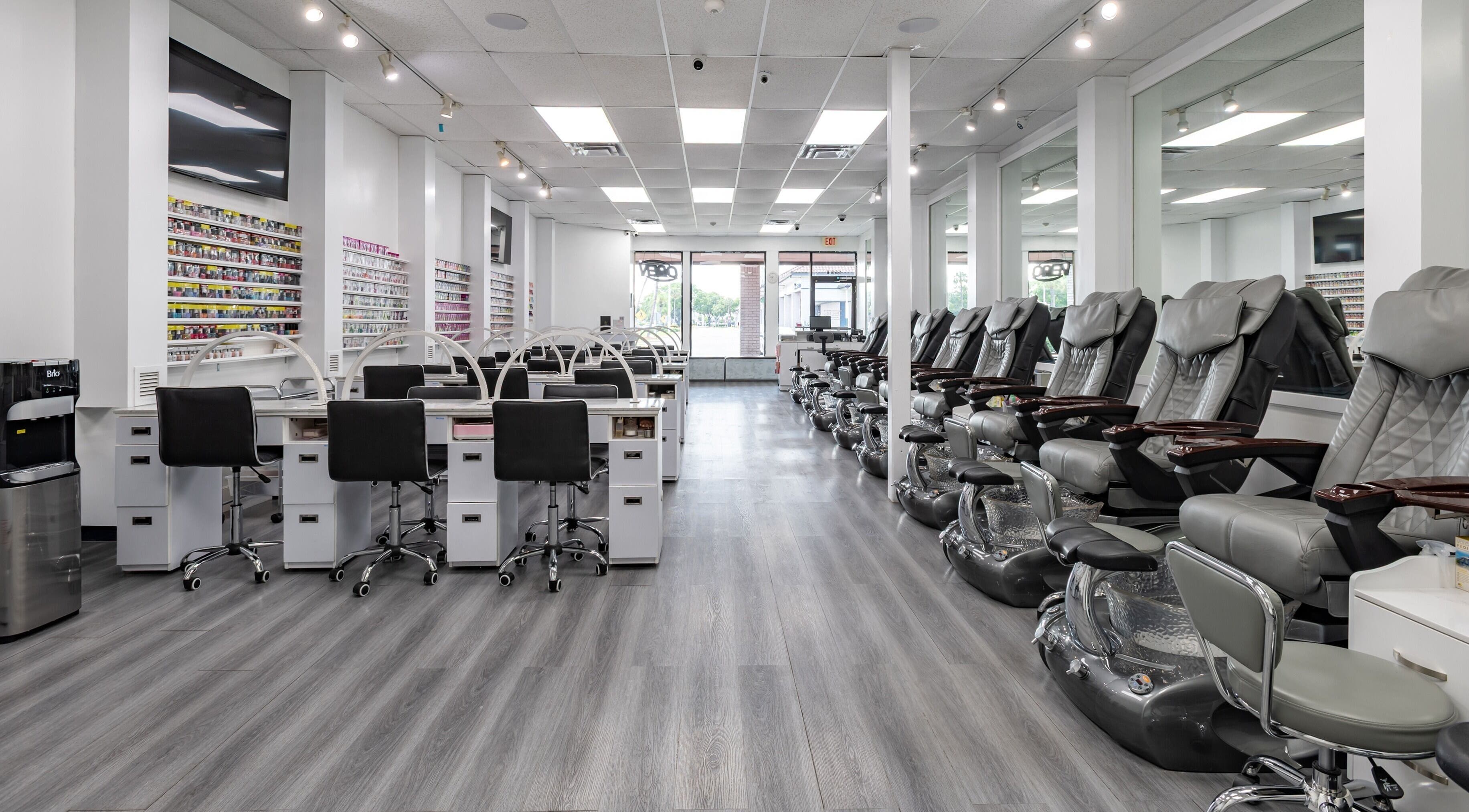 Interior of Lash & Nail Spa Hialeah showcasing modern nail stations and pedicure chairs in Hialeah, Florida, US.